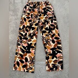 Tullea. Floral Print Women's Pants. Size M